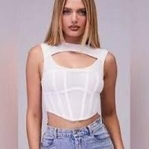 Mistress rocks white structured corset